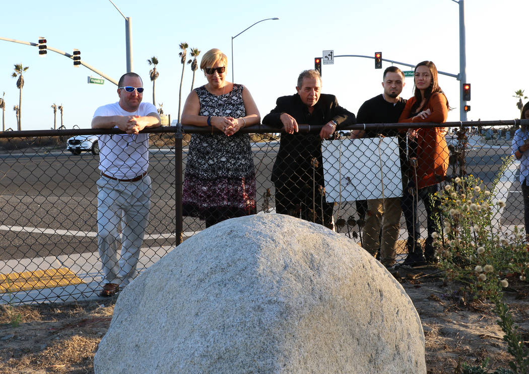 Morgan Mack, left, his wife Renne, the parents of Dylan Mack, 18, and Albert Rossi, a father o ...