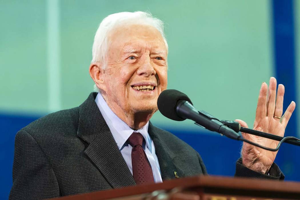 FILE - In this Sept. 18, 2019, file photo former President Jimmy Carter acknowledges a student ...