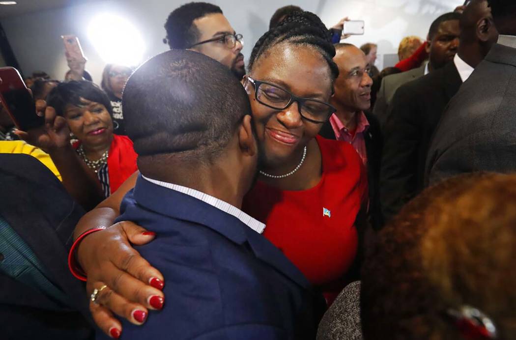 Allison Jean, center, the mother of Botham Jean, hugs a supporter after fired Dallas police off ...