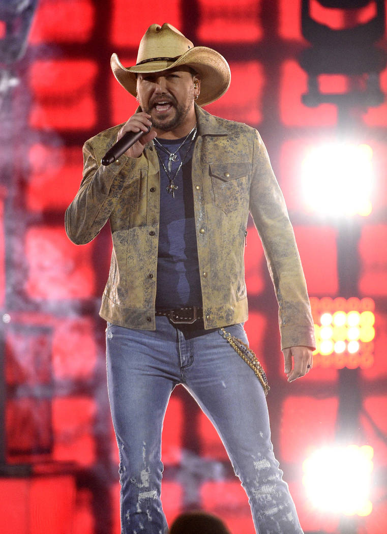 Jason Aldean performs "Can't Hide Red" at the 54th annual Academy of Country Music Awards at th ...