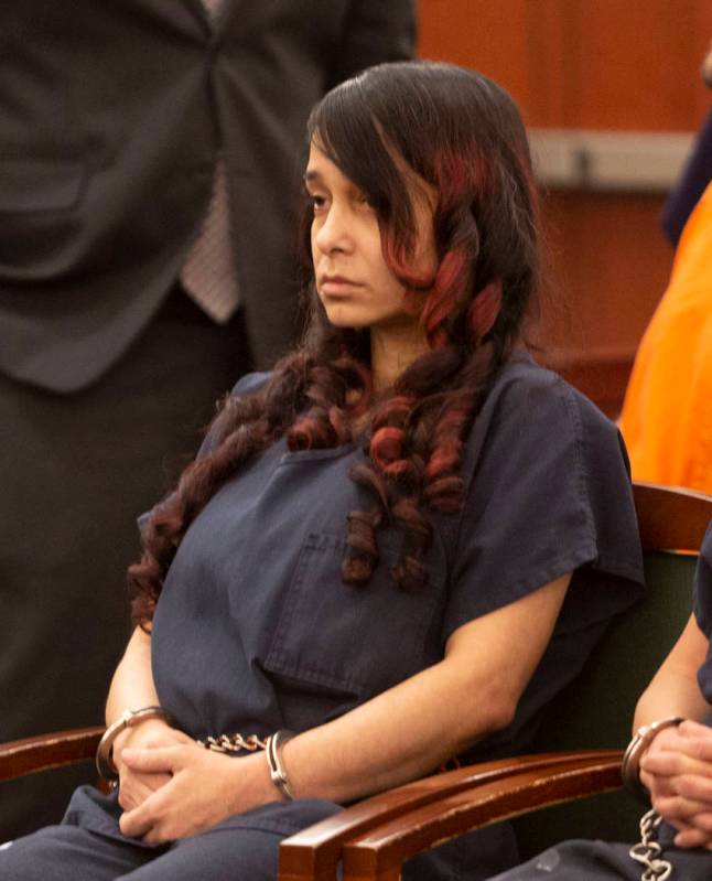 Gigi Mitchell, accused of trafficking an 11-year-old girl, appears in court during her sentenci ...