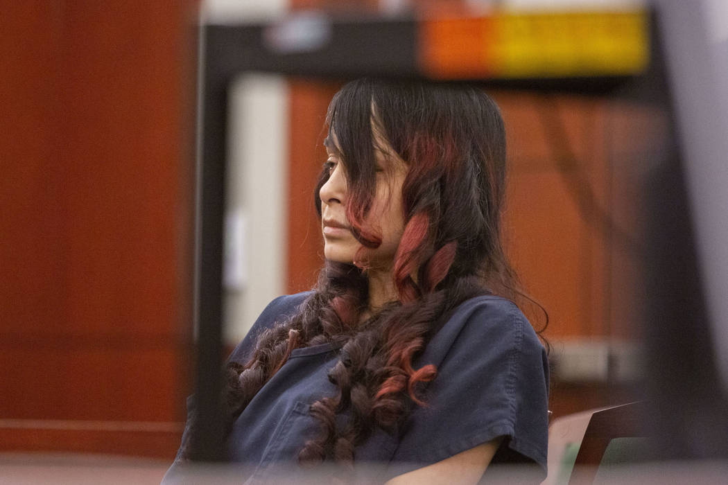 Gigi Mitchell, accused of trafficking an 11-year-old girl, appears in court during her sentenci ...