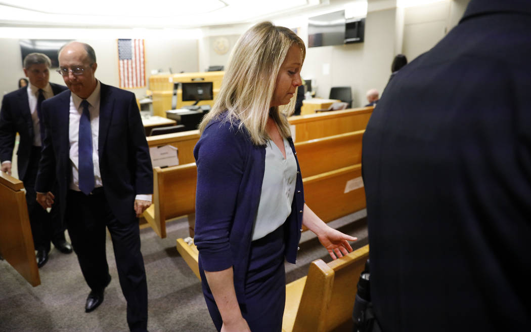 Fired Dallas police officer Amber Guyger leaves the courtroom after a jury found her guilty of ...