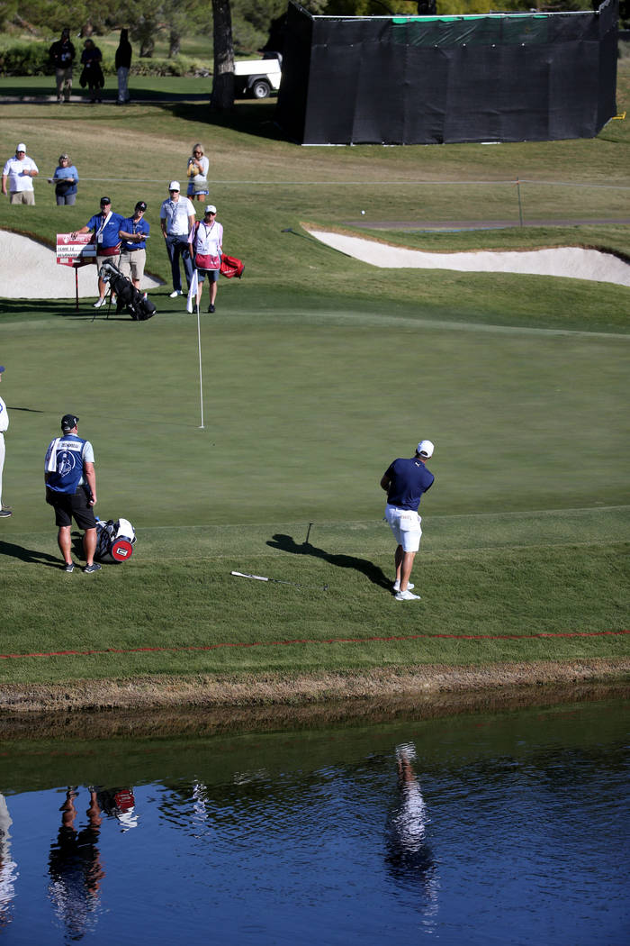 Bryson DeChambeau hits on the 18th green during the Shriners Hospitals for Children Open Pro-Am ...
