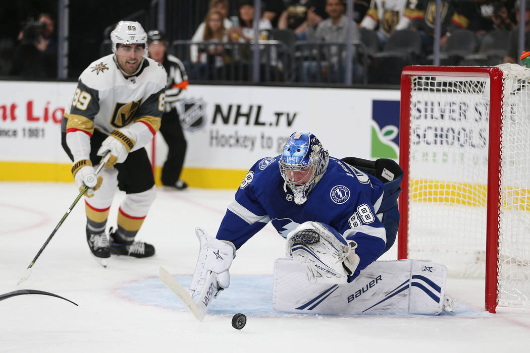 Tampa Bay Lightning goaltender Andrei Vasilevskiy (88) defends a shot against Vegas Golden Knig ...