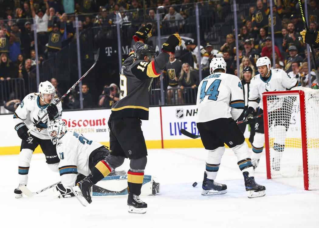 Golden Knights' Reilly Smith (19) celebrates after scoring past San Jose Sharks goaltender Mart ...