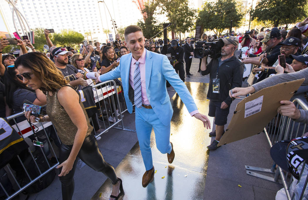 Golden Knights' Tomas Nosek arrives at the gold carpet for the NHL season-opening hockey game a ...