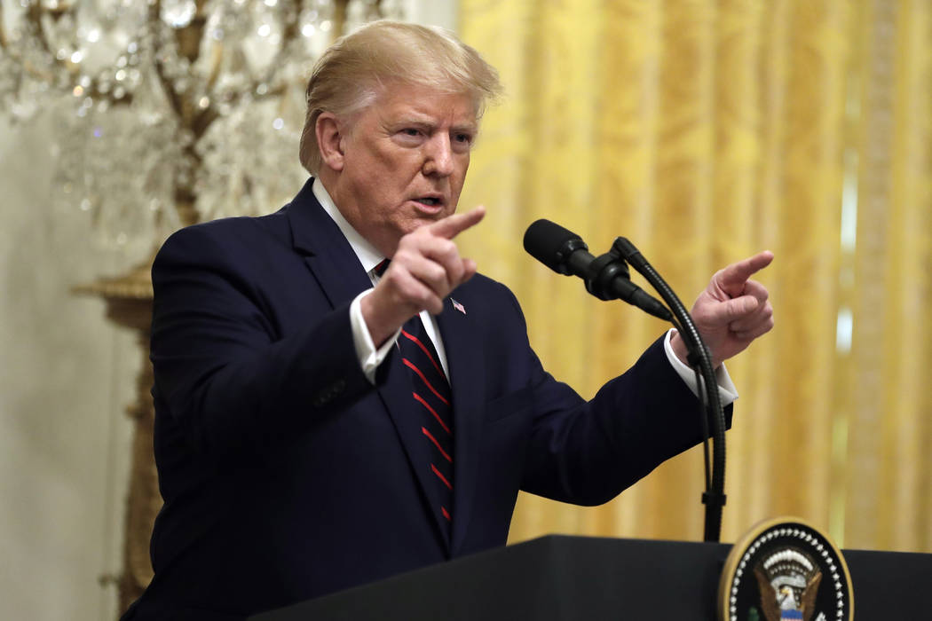 President Donald Trump speaks during news conference with Finnish President Sauli Niinisto in t ...