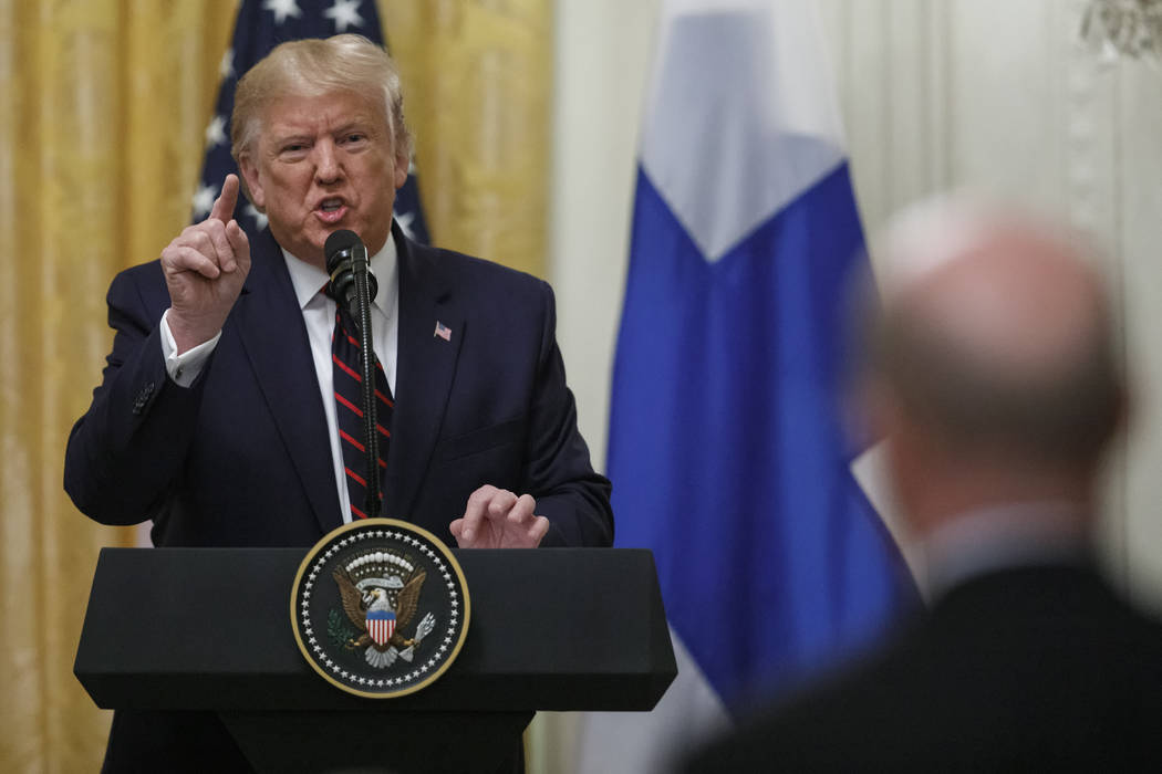 President Donald Trump speaks during a news conference with and Finnish President Sauli Niinist ...