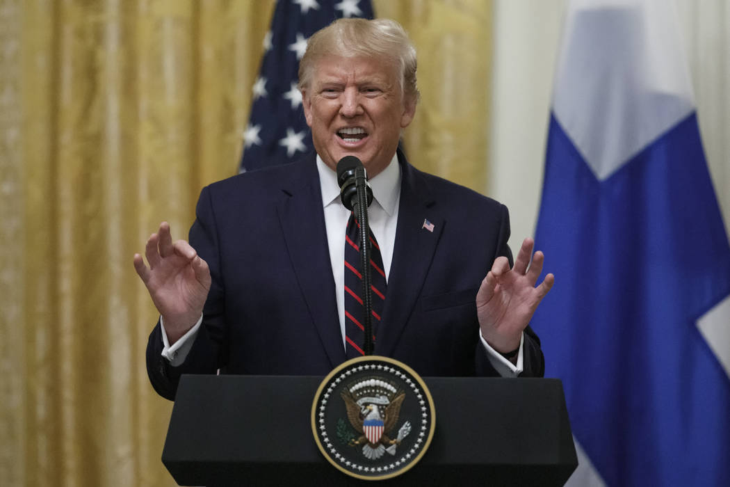 President Donald Trump speaks during a news conference with Finnish President Sauli Niinisto at ...