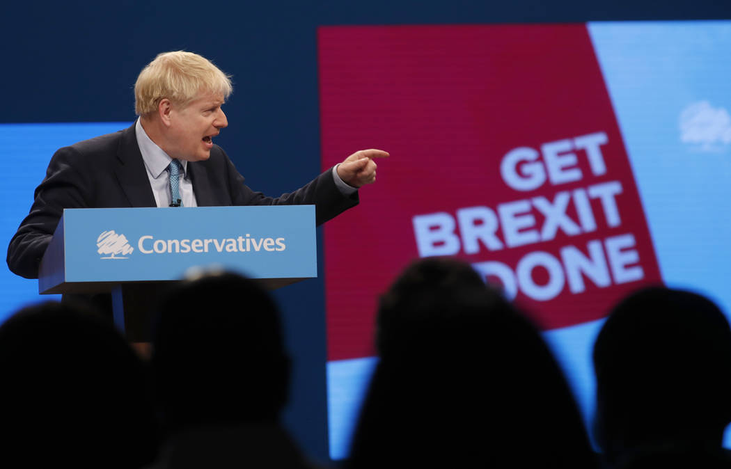 Britain's Prime Minister Boris Johnson delivers his Leader's speech at the Conservative Party C ...