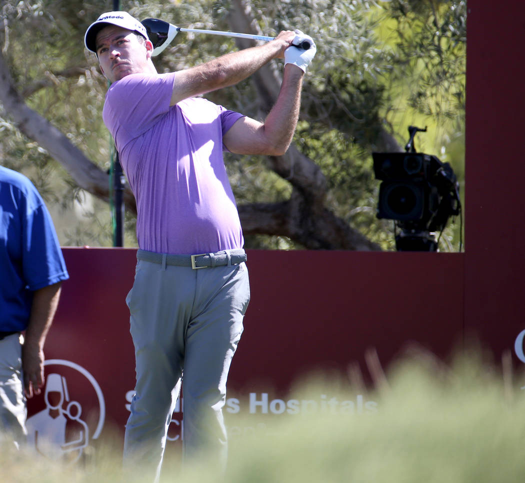 Nick Taylor watches his shot on the ninth tee during Shriners Hospitals for Children Open at TP ...