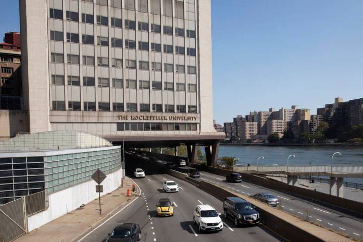 In a Sept. 26, 2019, photo, cars pass Rockefeller University in New York. Prestigious universit ...