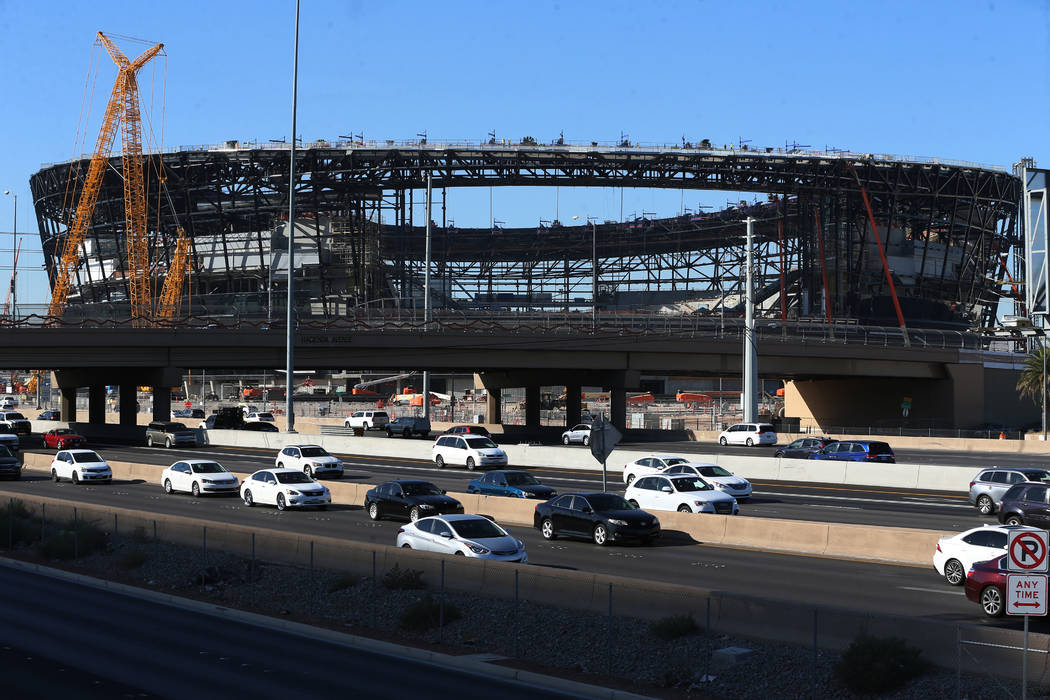 The Hacienda Avenue bridge is seen in front of the Raiders Allegiant Stadium in Las Vegas, Thur ...