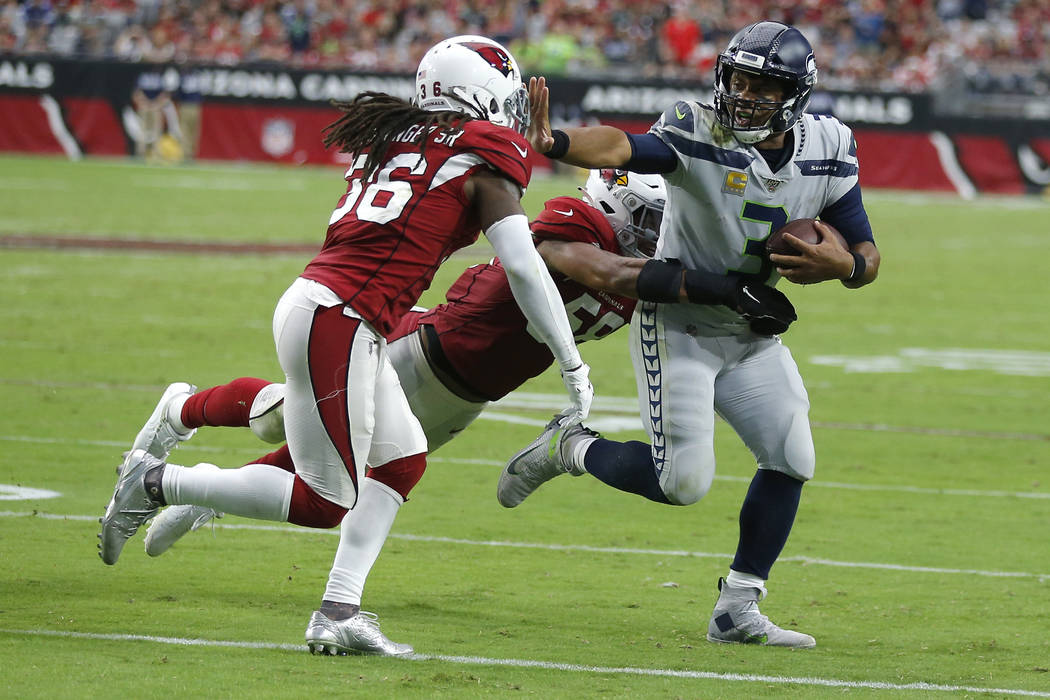 Seattle Seahawks quarterback Russell Wilson (3) during an NFL football game against the Arizona ...