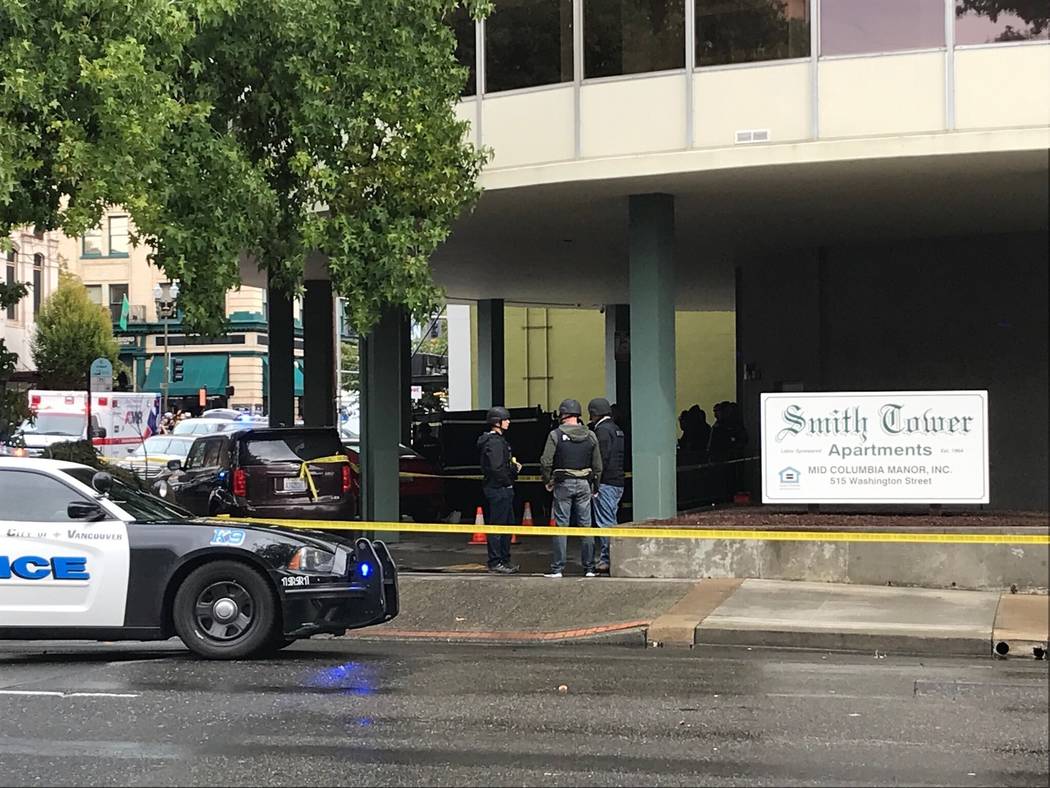Police surround Smith Tower after reports of a shooting, Thursday, Oct. 3, 2019 in Vancouver, W ...