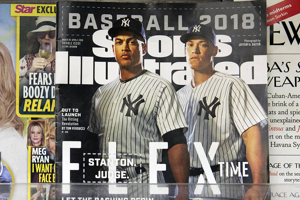 An issue of Sports Illustrated is displayed on a newsstand, Tuesday, May 28, 2019 in New York. ...