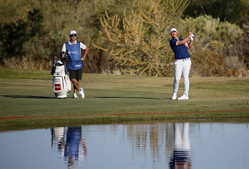 Brooks Koepka hits on the 18th hole during second round of Shriners Hospitals for Children Open ...