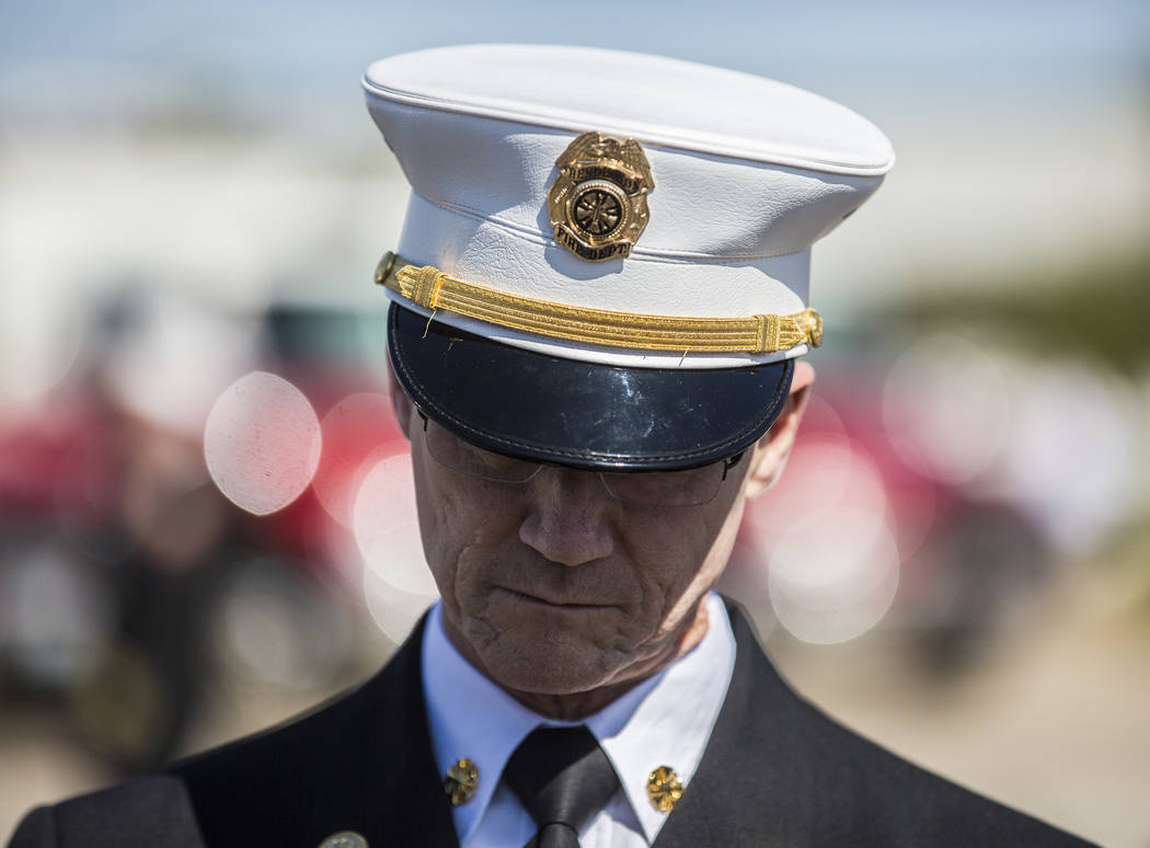 Henderson Fire Department Chief Shawn White waits for the motorcade to begin for Henderson Fire ...