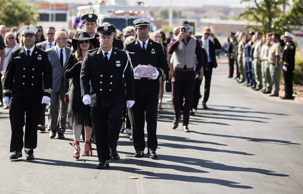 The procession for Henderson Fire Department firefighter/paramedic Robbie James Pettingill appr ...
