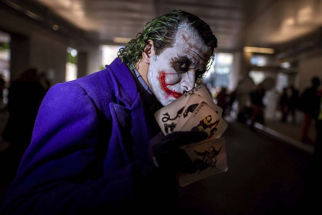 An attendee dressed as the Joker poses during New York Comic Con at the Jacob K. Javits Convent ...