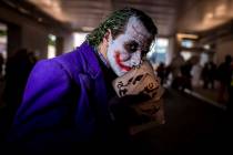 An attendee dressed as the Joker poses during New York Comic Con at the Jacob K. Javits Convent ...