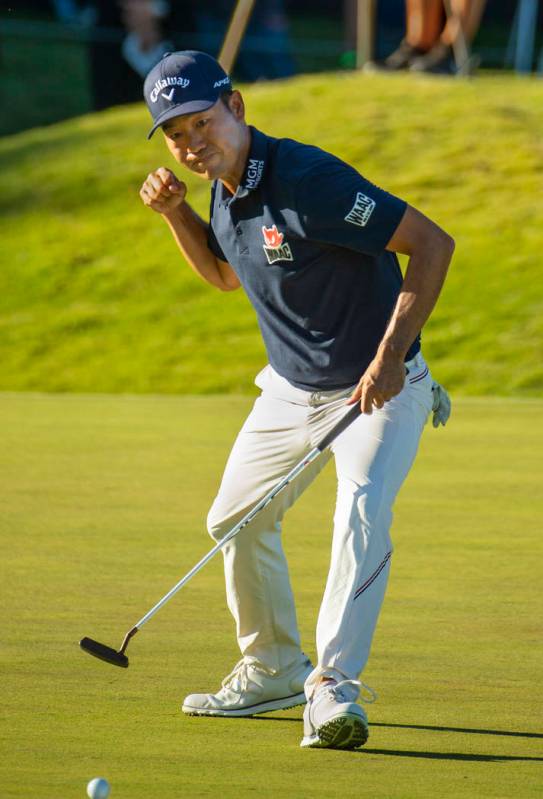 Kevin Na gets pumped as the ball heads toward the cup on hole 18 during the third round of Shri ...