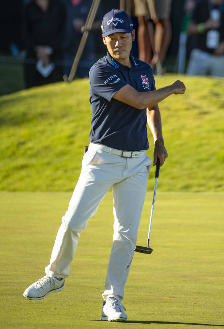 Kevin Na celebrates as the ball drops in the cup on hole 18 during the third round of Shriners ...