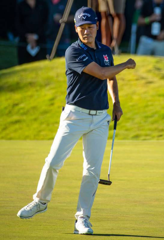 Kevin Na celebrates as the ball drops in the cup on hole 18 during the third round of Shriners ...