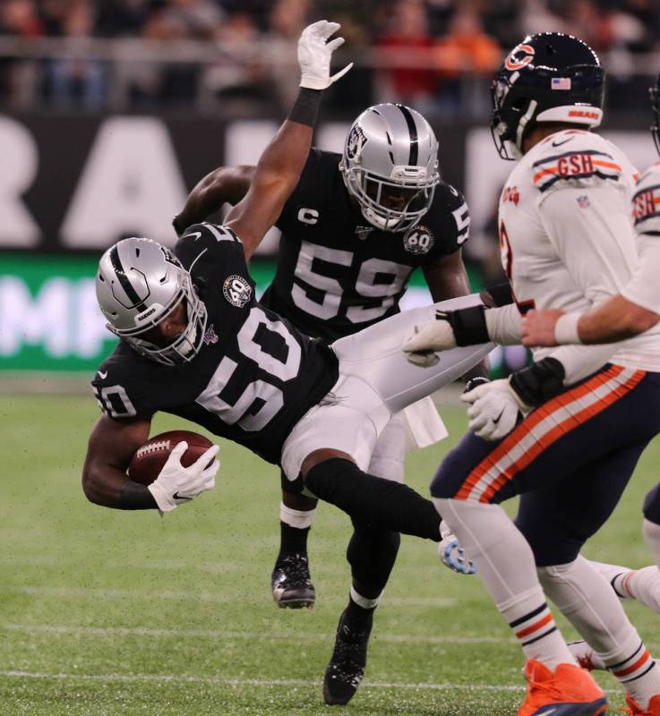 Oakland Raiders linebacker Nicholas Morrow (50) intercepts Chicago Bears quarterback Chase Dani ...