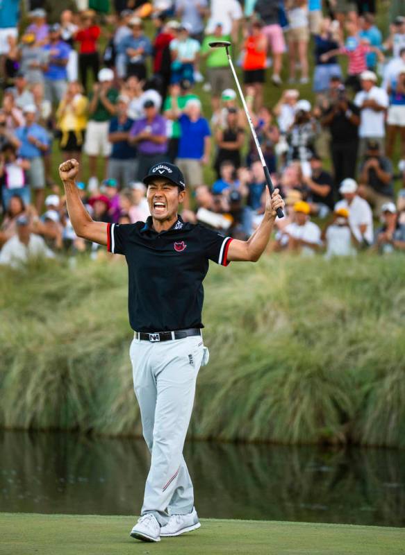 Kevin Na celebrates his victory on the second playoff hole at 18 during the final round of Shri ...