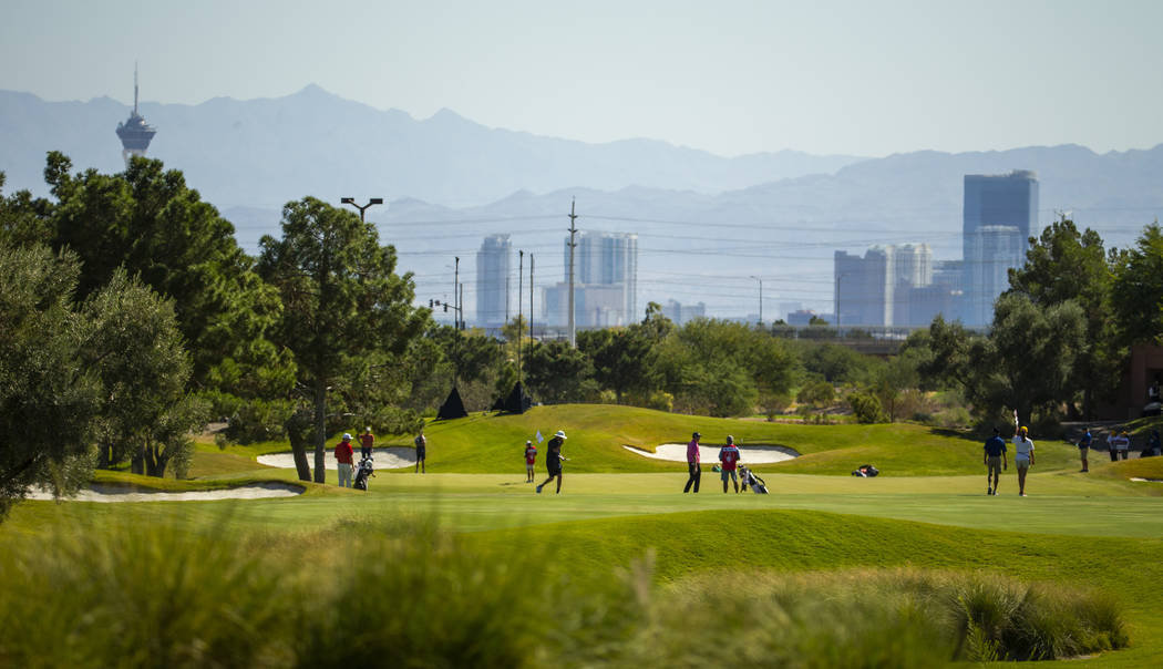 Golfers get a view of the city on the front nine during the final round of Shriners Hospitals f ...