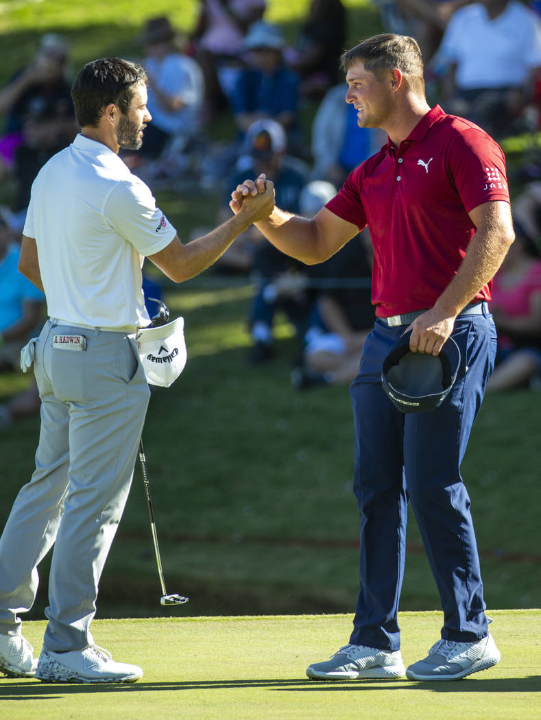 Adam Hadwin , left, and Bryson DeChambeau shake after finishing hole 18 during the final round ...