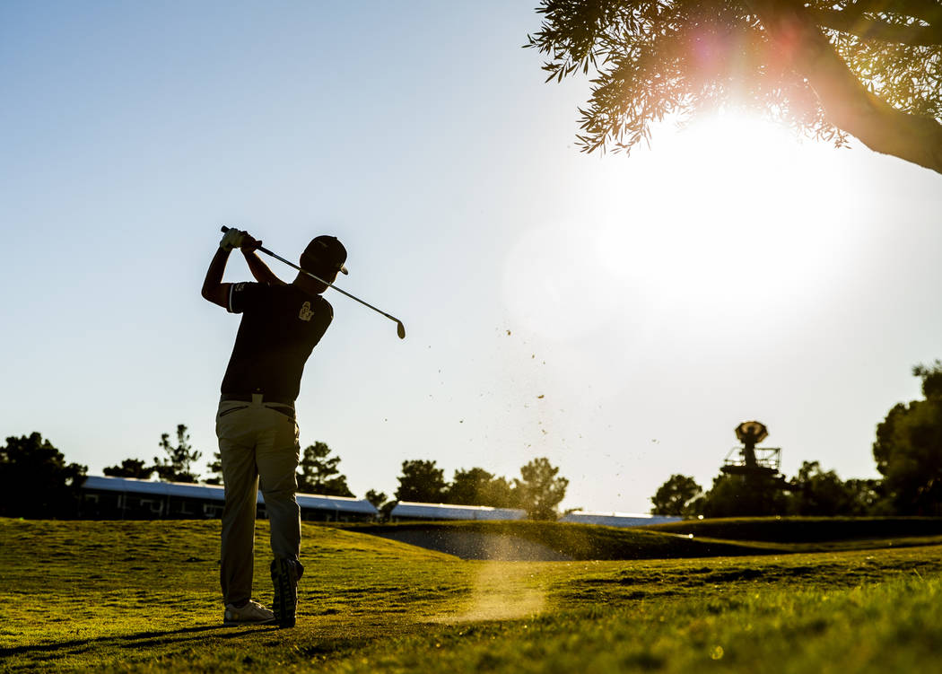 Kevin Na hits onto the green at hole 18 during the final round of Shriners Hospitals for Childr ...