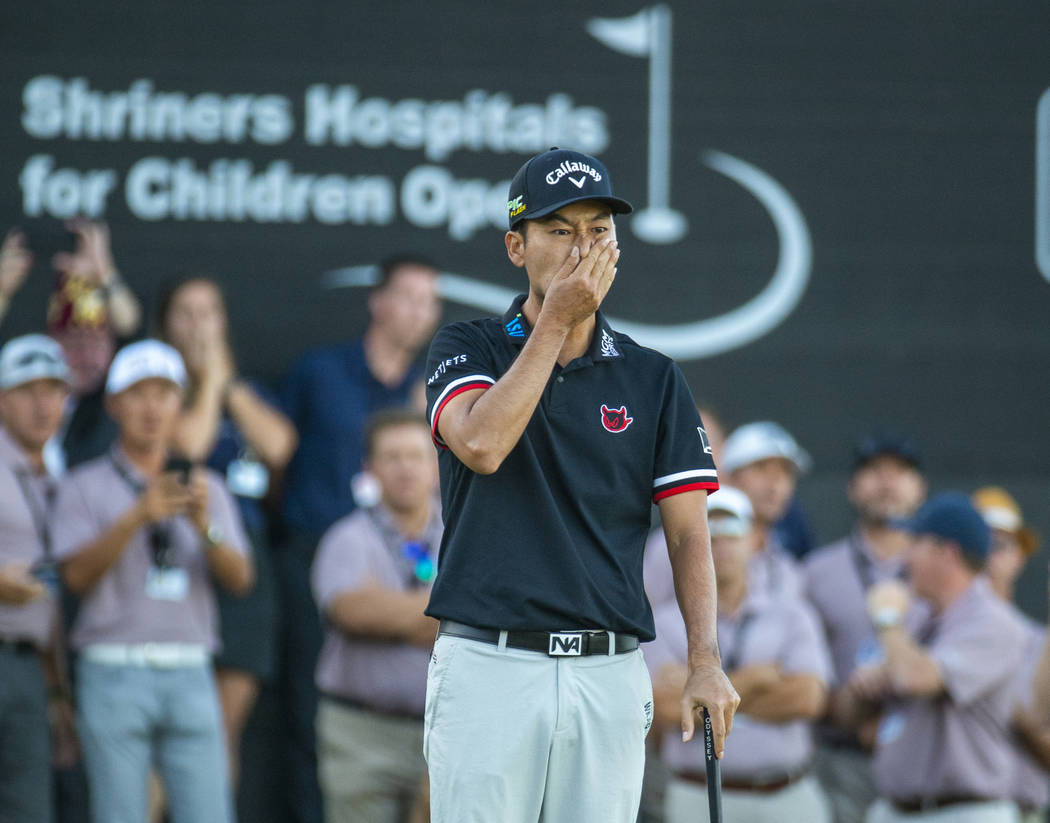 Kevin Na is shocked at a near miss to win while putting on the green at hole 18 during the fina ...