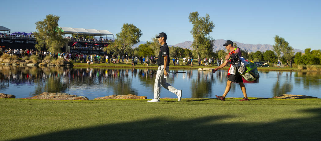 Kevin Na makes his way up to the green at hole 16 during the final round of Shriners Hospitals ...