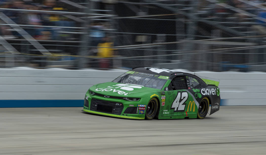 Kyle Larson drives on the way to winning the NASCAR Cup Series playoff auto race Sunday, Oct. 6 ...