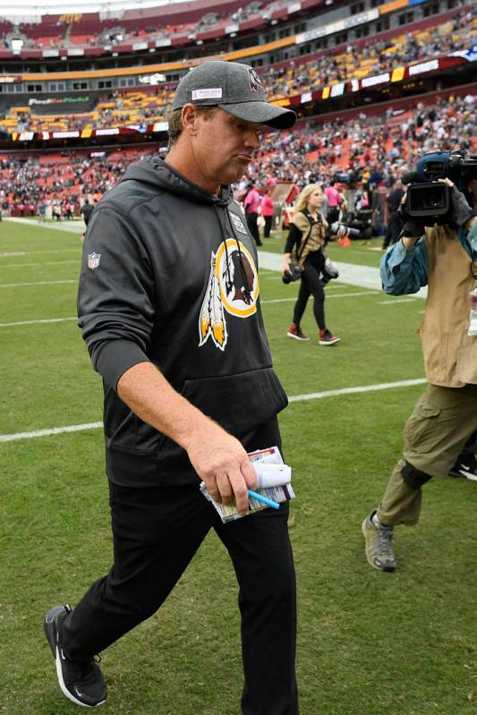 Washington Redskins head coach Jay Gruden leaves the field after an NFL football game against t ...