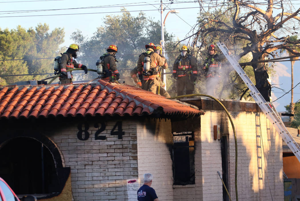 Clark County and Las Vegas firefighters battle a fire in a commercial area at 824 E. Sahara Ave ...