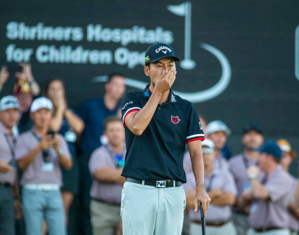 Kevin Na is shocked at a near miss to win while putting on the green at hole 18 during the fina ...