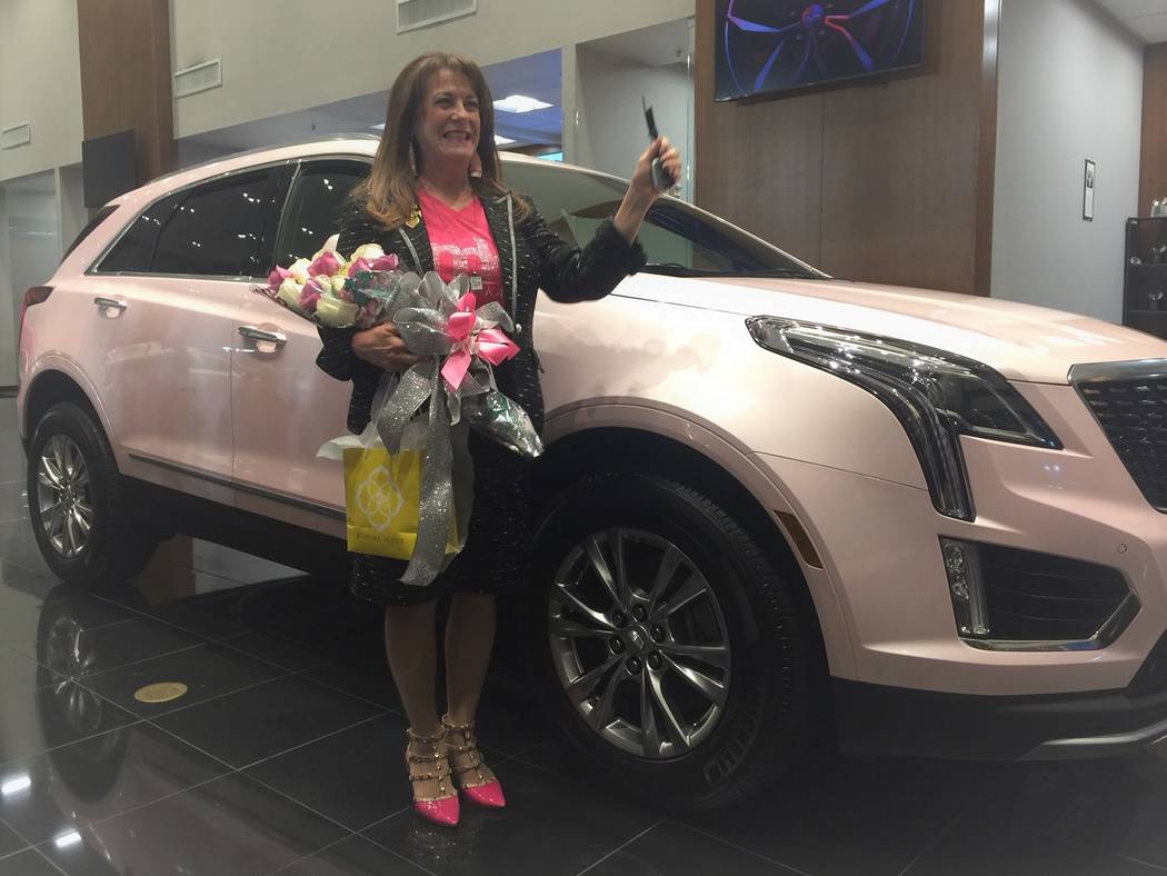 Mary Kay sales consultant Linda Kieper is seen with her 2020 Cadillac XT5 Premium Luxury that s ...