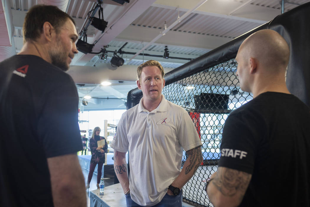 UFC Hall of Famer Forrest Griffin, left, former SEAL Team Six leader Rob O'Neill, center, and V ...