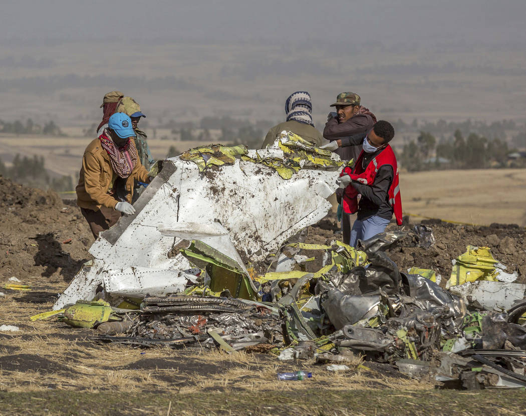 FILE - In this March 11, 2019, file photo, rescuers work at the scene of an Ethiopian Airlines ...
