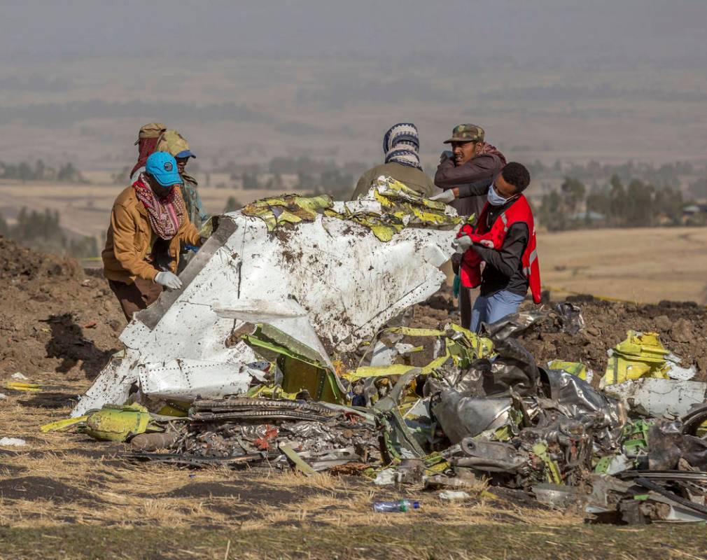 FILE - In this March 11, 2019, file photo, rescuers work at the scene of an Ethiopian Airlines ...