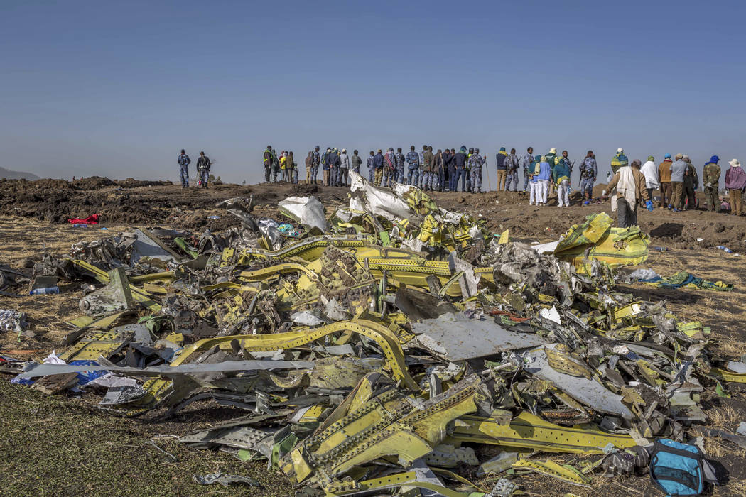 FILE - In this March 11, 2019, file photo, wreckage is piled at the crash scene of an Ethiopian ...