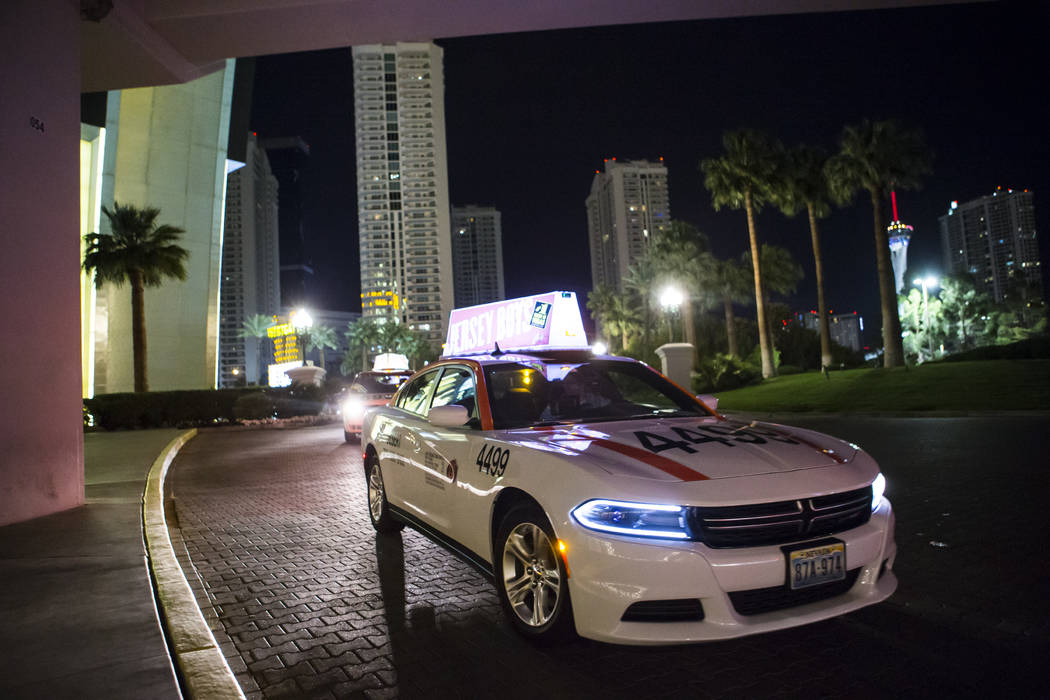 Desert Cab taxi driver Andrew Gnatovich lines up to pick up passengers at the Westgate in Las V ...