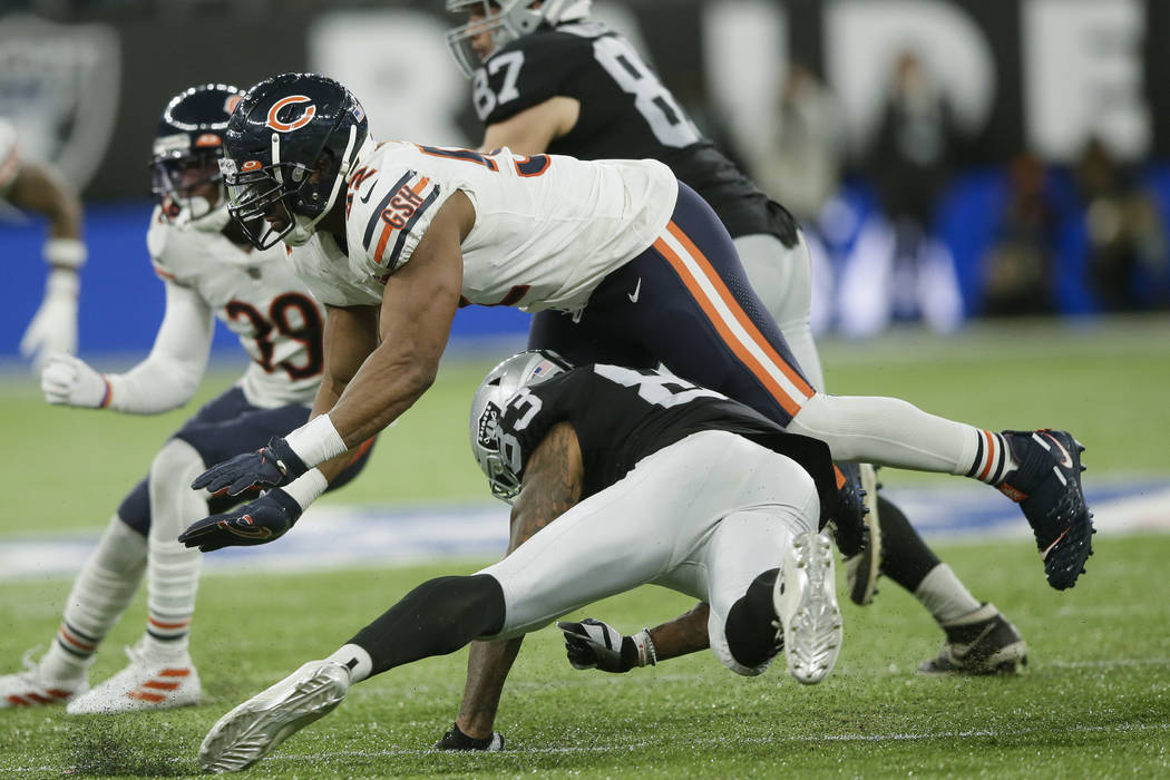 Chicago Bears outside linebacker Khalil Mack (52) rushes during the second half of an NFL footb ...