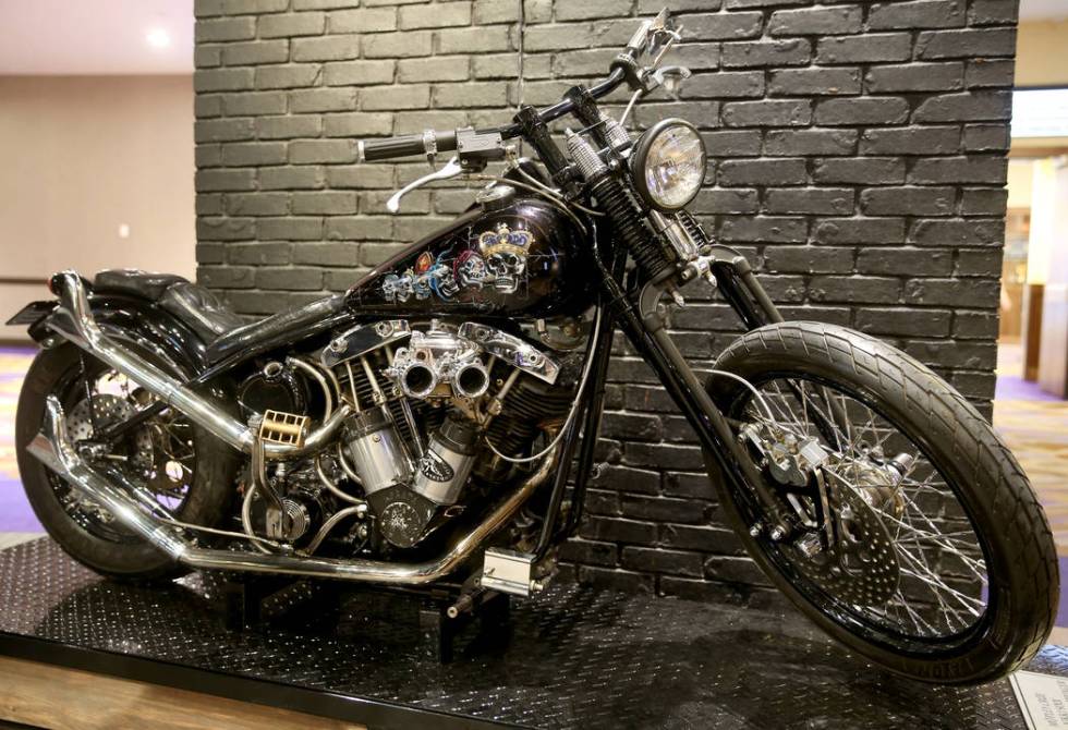 Motley Crue's Nikki Sixx's custom Harley Davidson Hardtail Springer at a new rock memorabilia e ...