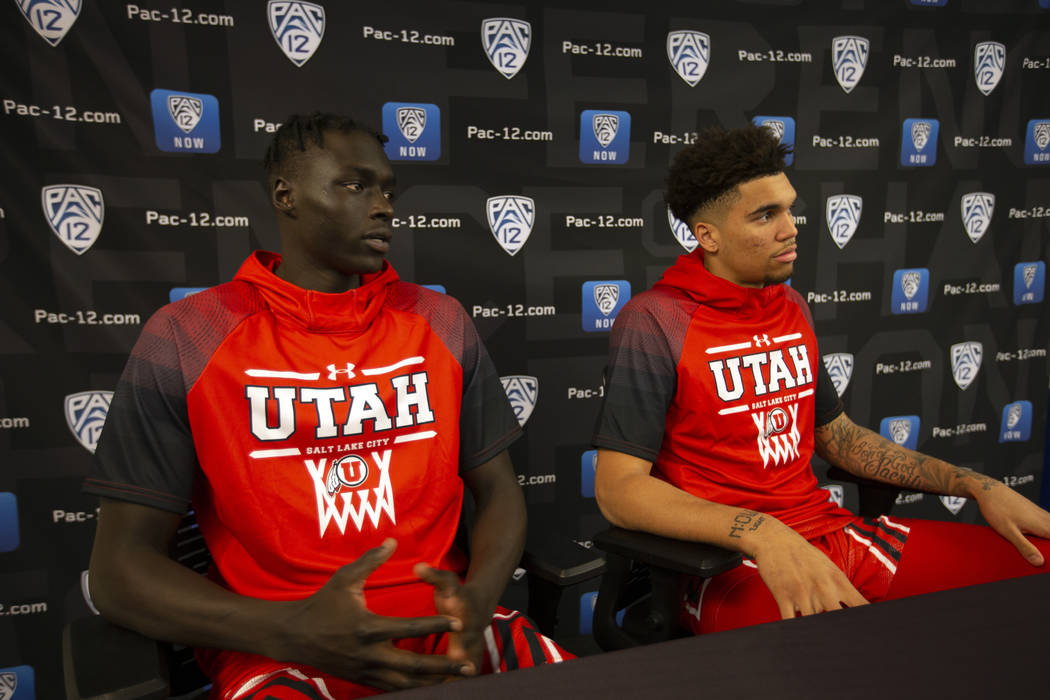Utah's Both Gach, left, and Timmy Allen speak during the Pac-12 NCAA college basketball media d ...