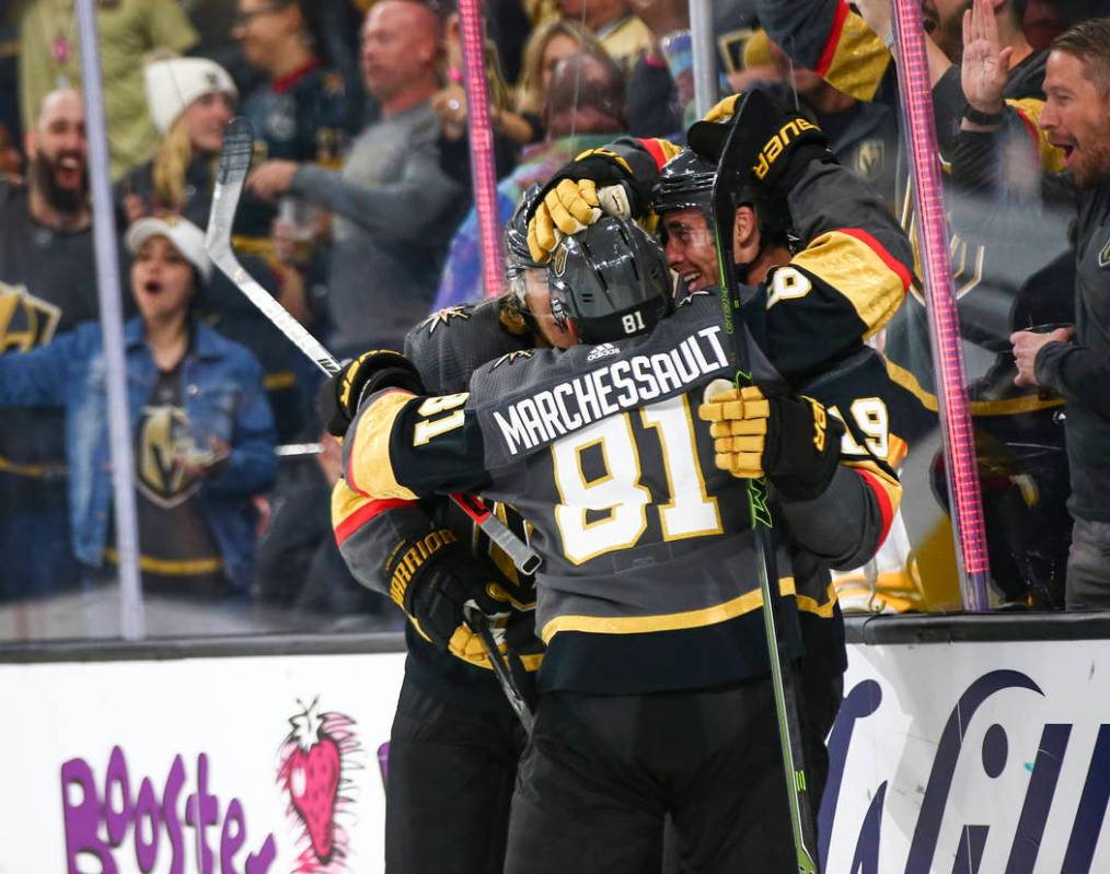 Golden Knights' Reilly Smith, right, celebrates his goal against the Boston Bruins with teammat ...